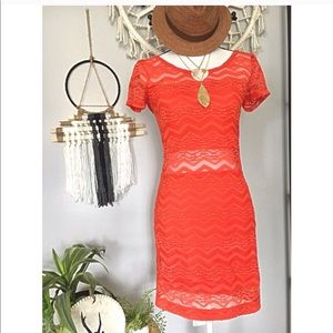 Free People lace orange mini-dress. Size small.